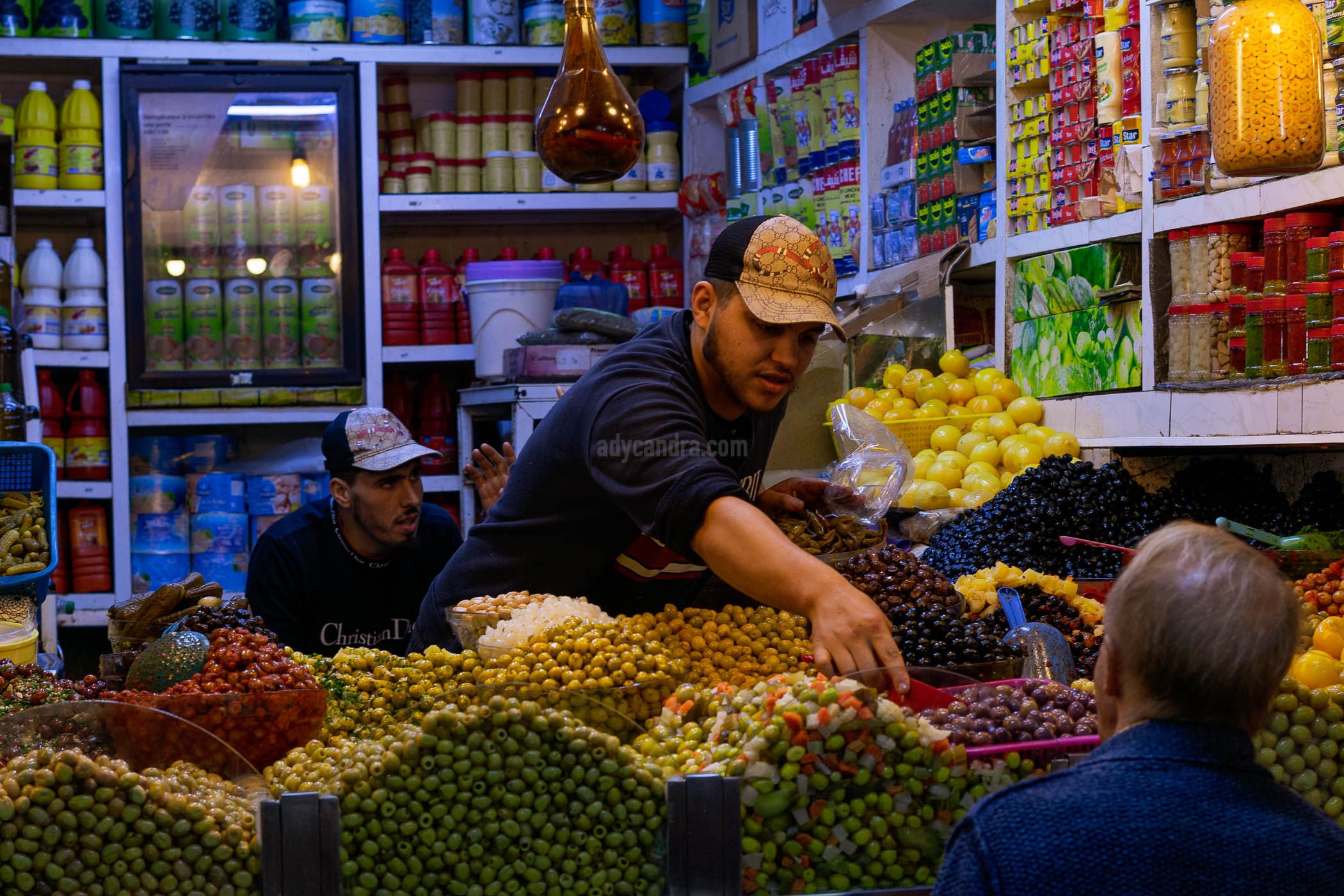 Olives Fruit Merchant With Buyer